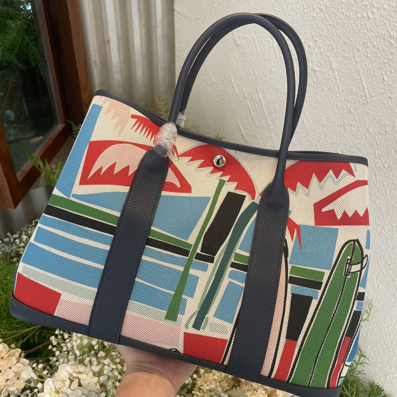 H**mes shopping bags